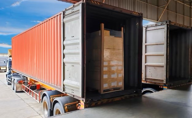 Container being loaded with palletised cargo
